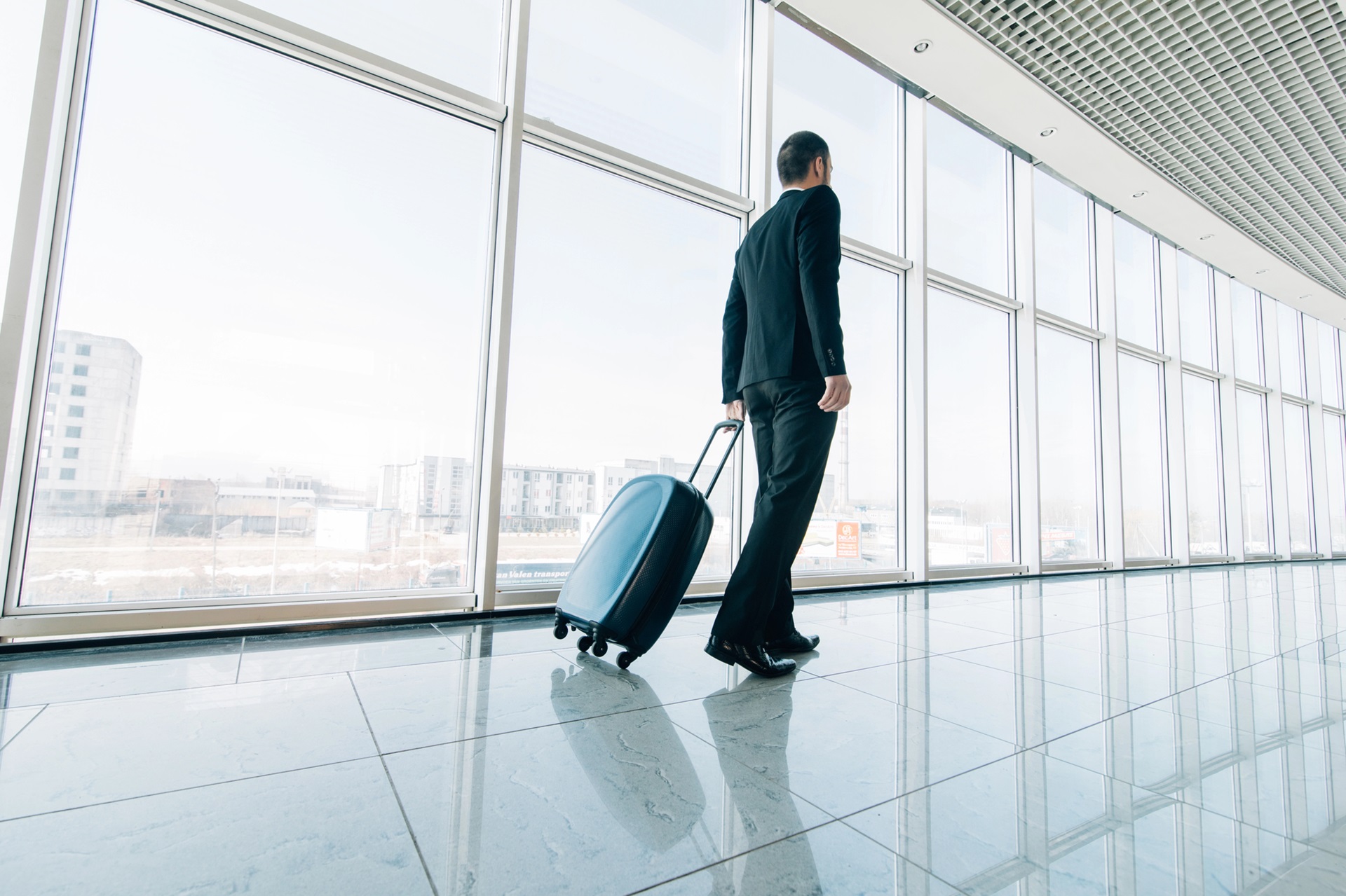a man with suitcase
