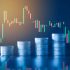 Stack,Of,Money,Coin,With,Trading,Graph,,Financial,Investment,Concept