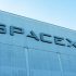 SpaceX sign logo on Space Exploration Technologies Corp headquarters building. SpaceX is private American aerospace manufacturer - Hawthorne, California, USA - 2020